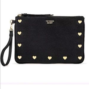 Victoria secrets wristlet! Not super small.